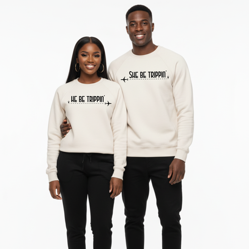 Two people wearing matching 'He Be Trippin' and 'She Be Trippin' sweatshirts on a white background