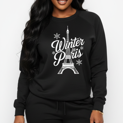 Black sweatshirt with 'Winter in Paris' design worn by a person on a white background